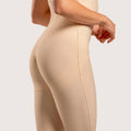 Rear view of the BE13 bodysuit in black, demonstrating the glute-lifting architecture and high-back support for optimal post-surgical contouring.
