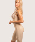 Full side view of the BS04 Stage 2 compression bodysuit, showing the mid-thigh length and high-waist abdominal support for comprehensive post-surgical contouring.