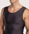 Close-up detail of the black MG04 compression vest, highlighting the breathable medical-grade material and flat-seamed edges for irritation-free wear.