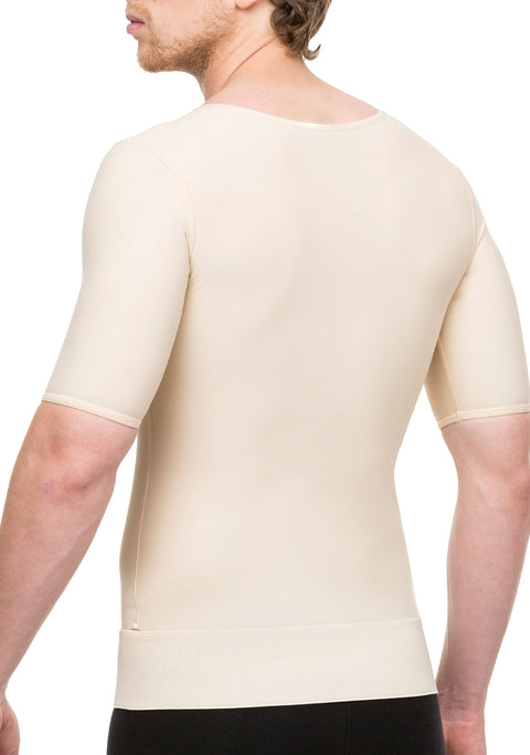 Man wearing a beige compression shirt on a white background
